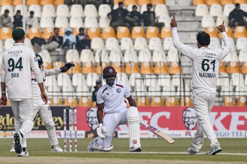 West Indian batsman Justin Greaves reacts after his dismissal by Pakistan's Noman Ali