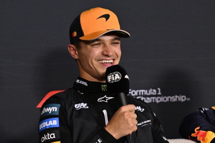 McLaren's Lando Norris was all smiles after securing pole at the Australian Grand Prix