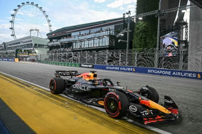 Red Bull Racing's Dutch driver Max Verstappen drives during the third practice session ahe