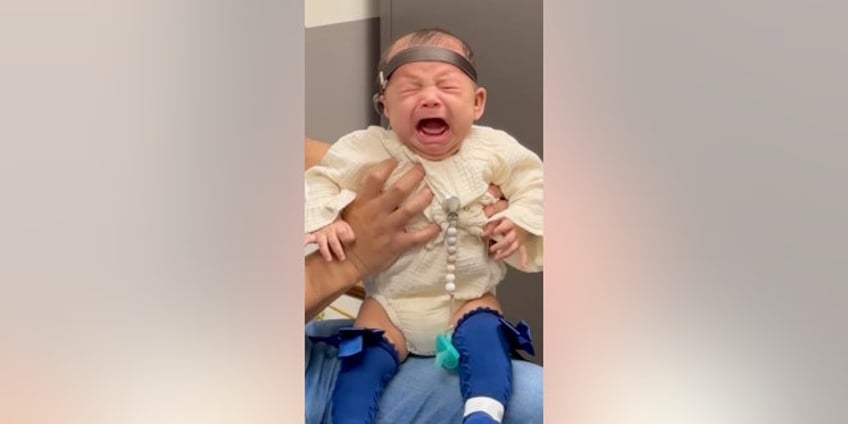 north carolina baby hears her fathers voice for the first time immediately bursts into tears