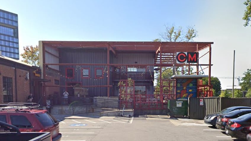 Common Market store, cars in parking lot