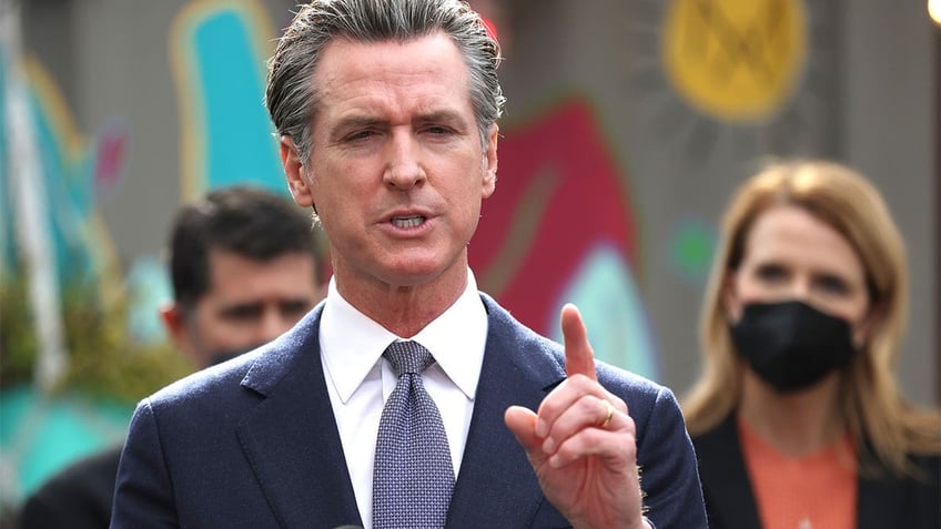 Gavin Newsom speaking at bill signing ceremony.