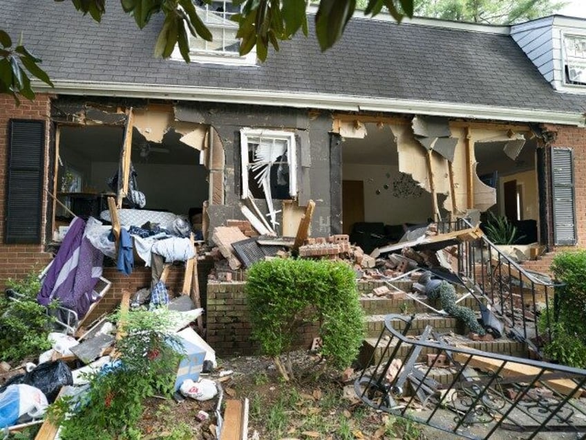 The crime scene at 5525 Galway Dr. where law enforcement officers were serving a warrant f