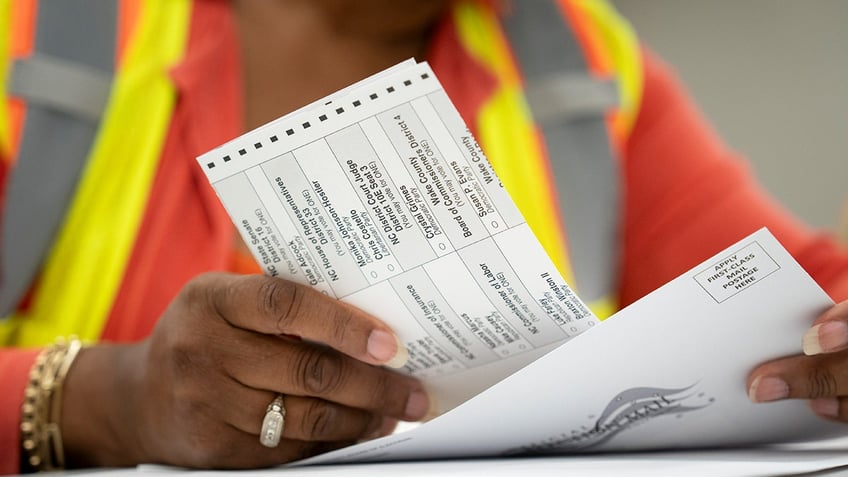 Absentee ballots are prepared to be mailed at the Wake County Board of Elections on Sept. 17, 2024 in Raleigh, North Carolina.