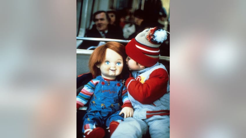 Chucky and Alex Vincent in a secne from "Child's Play."