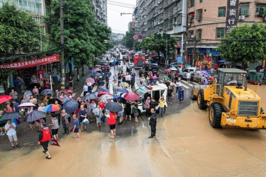 Large portions of China have been battered by heavy rains that have caused flooding and si