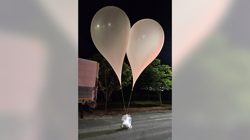 Balloons tied to trash presumably sent by North Korea are seen in South Chungcheong Province