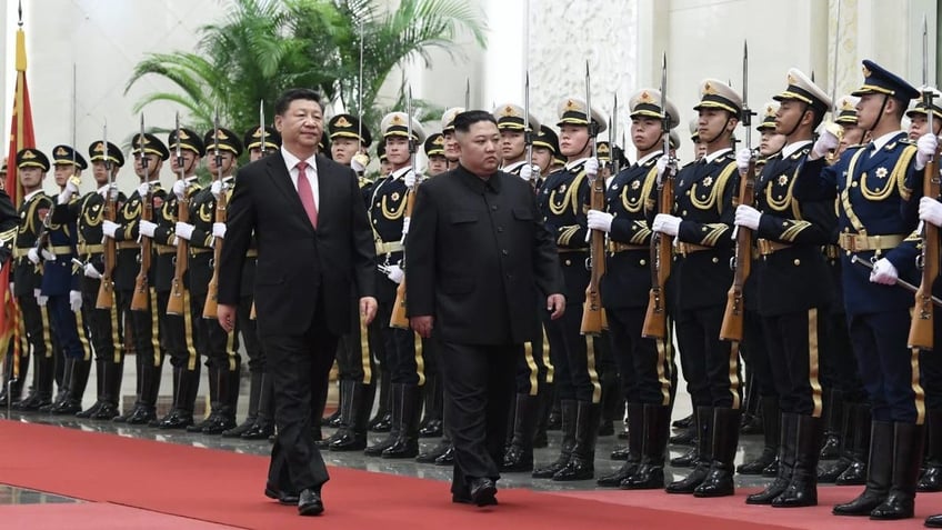 north korea and china share comradeship written with blood xi tells kim in official letter