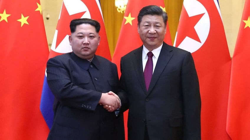 north korea and china share comradeship written with blood xi tells kim in official letter