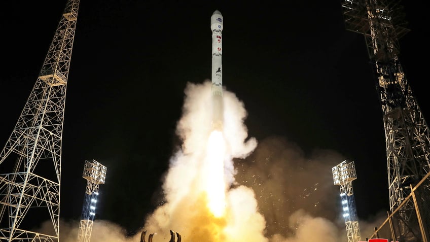 north korea building border guard posts following spy satellite launch south korea says