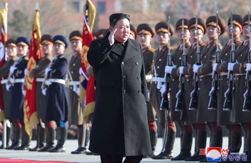 North Korean leader Kim Jong Un, seen reviewing troops, has been ramping up his rhetoric a