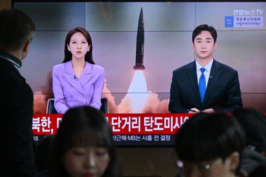 A South Korean news broadcast in Seoul on Tuesday shows file footage of a North Korean mis