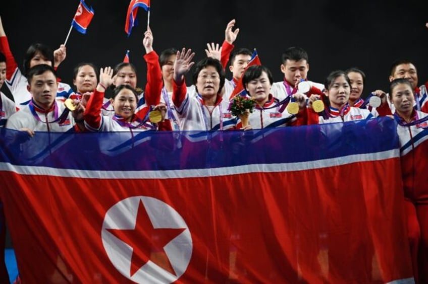 north korean weightlifters clean up in hangzhou but wont be at olympics