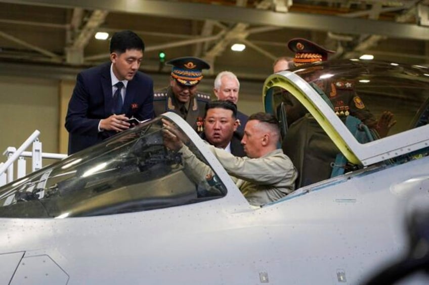 north koreas kim gets a close look at russian fighter jets as his tour narrows its focus to weapons