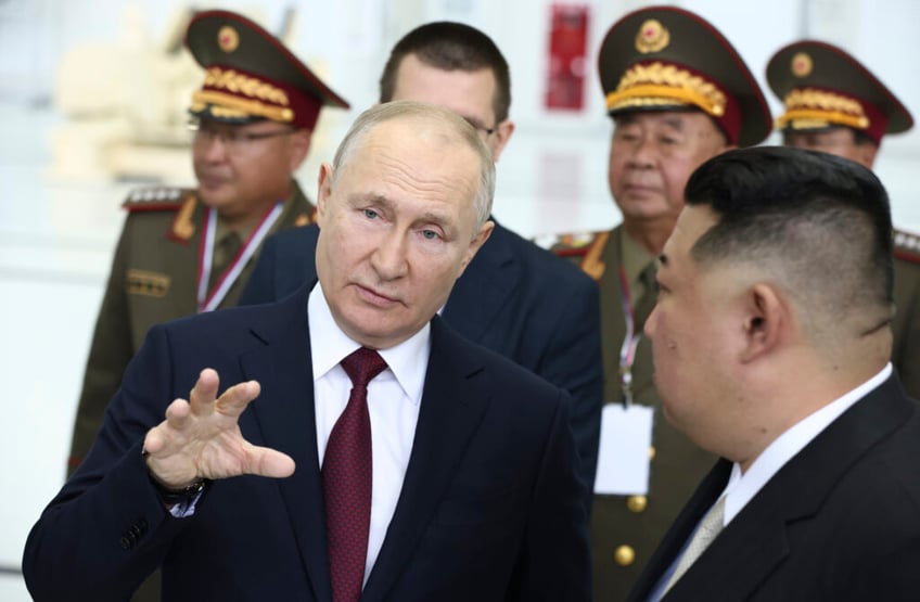 north koreas kim jong un meets vladimir putin praises heroic russian army at top space center