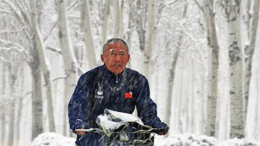 northeast china sees first major blizzard this season and forecasters warn of record snowfall