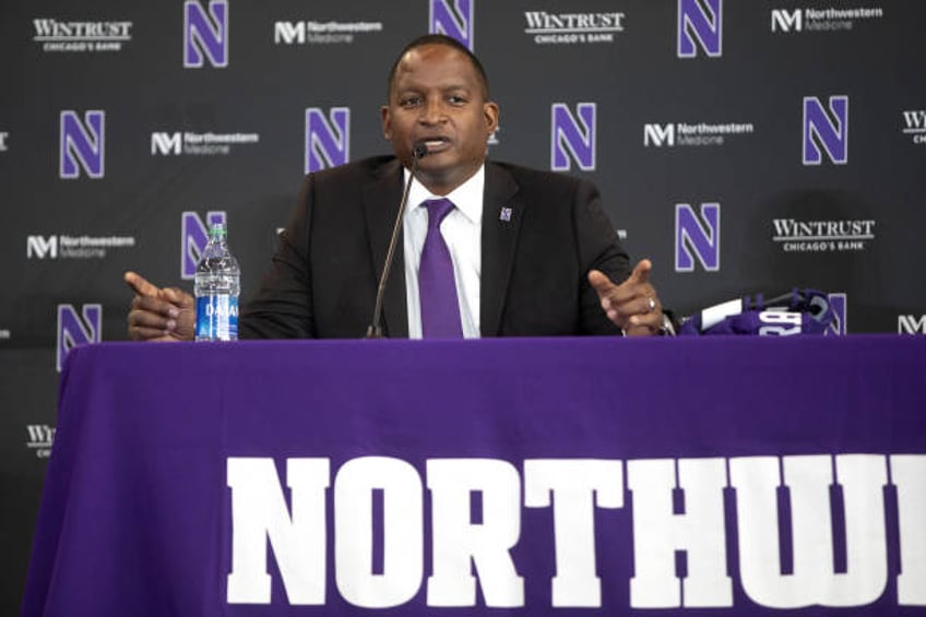 northwestern athletic director blasts football staffers for tone deaf shirts supporting fitzgerald