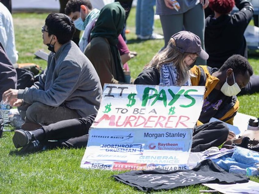 EVANSTON, ILLINOIS, USA - APRIL 25, 2024: Students set up tents outside Northwestern Unive