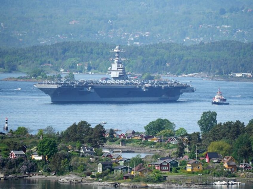 The 337-metre (1,106-foot) USS Gerald R. Ford aircraft carrier of the US Navy is seen in t