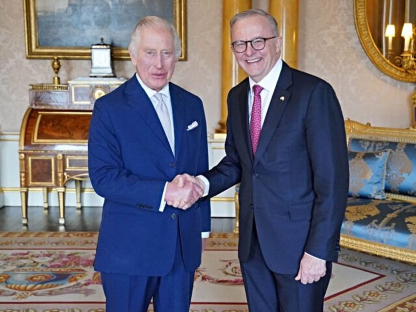 Britain's King Charles III (L) receives Australia's Prime Minister Anthony Albanese during an audience at Buckingham Palace in central London on May 2, 2023. (Photo by Jonathan Brady / POOL / AFP) (Photo by JONATHAN BRADY/POOL/AFP via Getty Images)