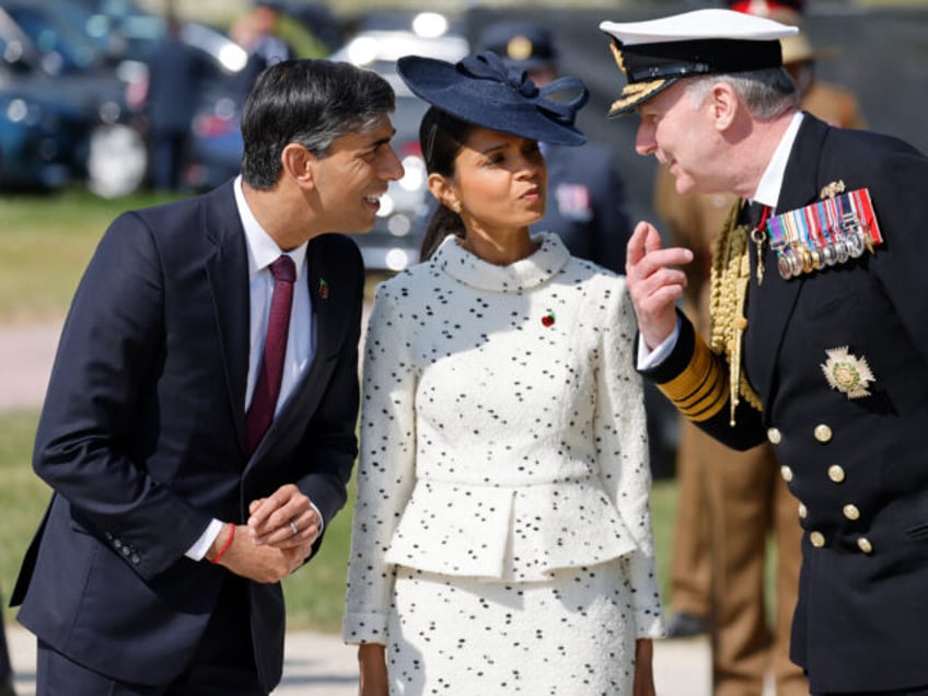 Britain's Prime Minister Rishi Sunak (L) and his wife, Akshata Murty attend the UK Ministr