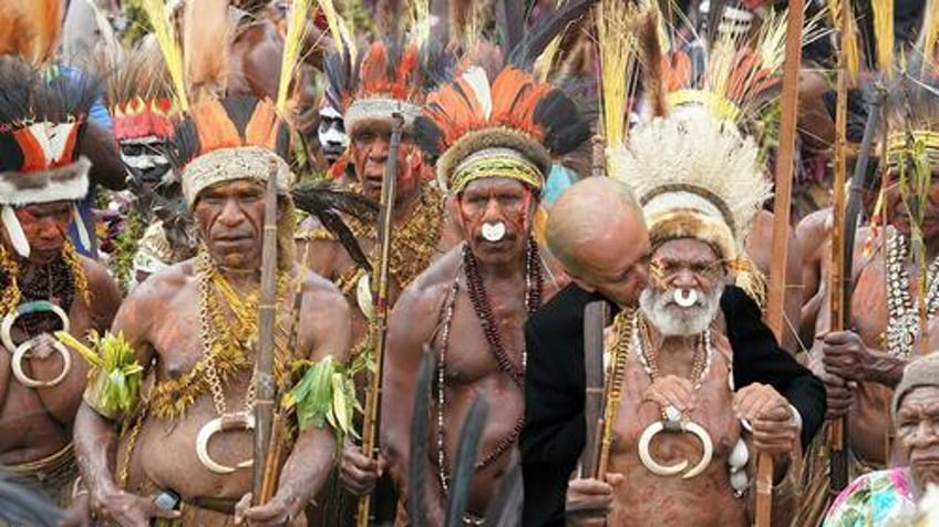 not the onion new guinea academics say cannibals would be offended by bidens tale of uncle being eaten
