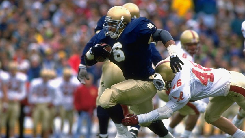 notre dame legend weighs in on ohio state following lou holtzs comments youve got to give them a nod