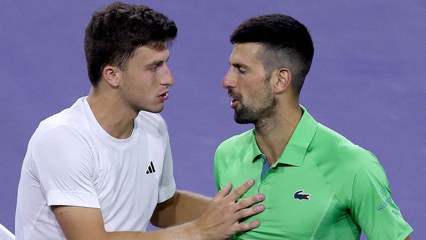 Novak and Luca Nardi speaking