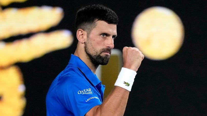 Novak Djokovic pumps his fist