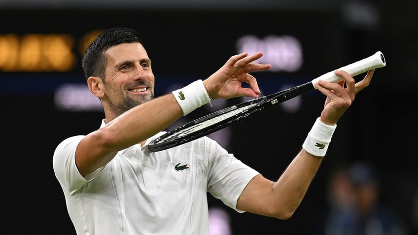 Novak Djokovic celebrates winning match