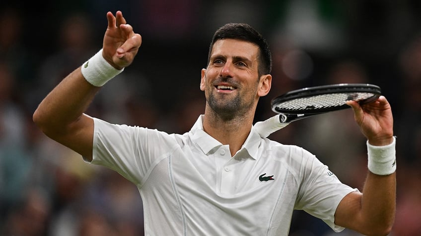 Novak Djokovic celebrates winning match