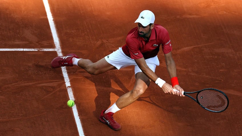 Novak Djokovic hits a shot