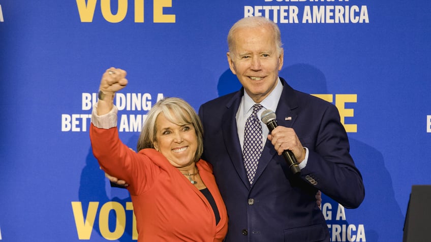 Gov. Lujan Grisham, left, with President Biden