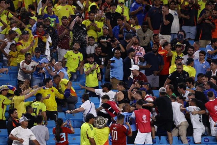 Uruguay's Darwin Nunez is involved in scuffles with Colombia fans after his team's 1-0 Cop