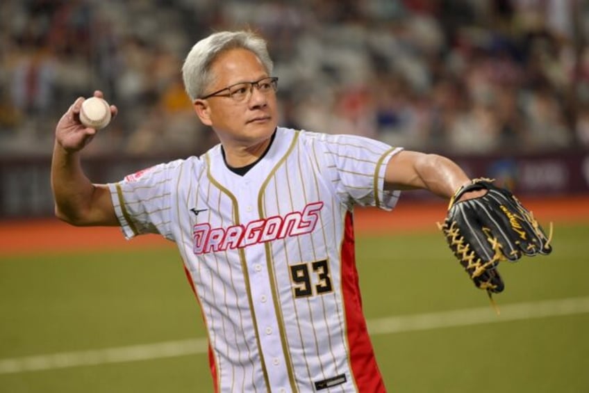 Nvidia CEO Jensen Huang throws out the opening pitch before a baseball game at the Taipei