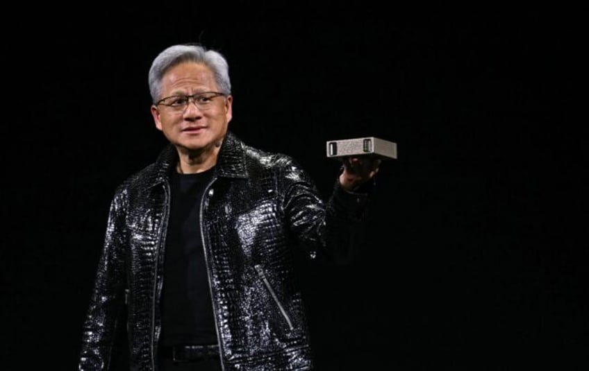 Nvidia CEO Jensen Huang unveiling a new line of GPUs designed to pack artificial intellige