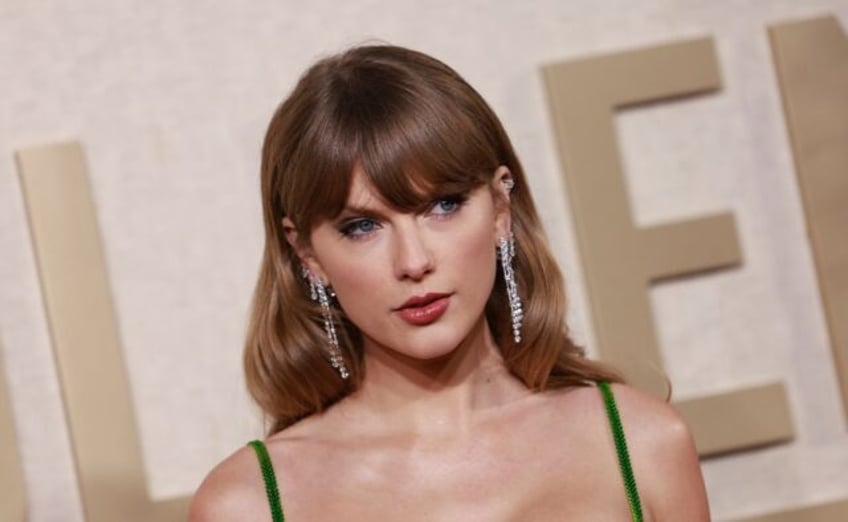 Taylor Swift, shown here arriving for the 81st annual Golden Globe Awards, is the subject or a controversial essay speculating over her sexuality