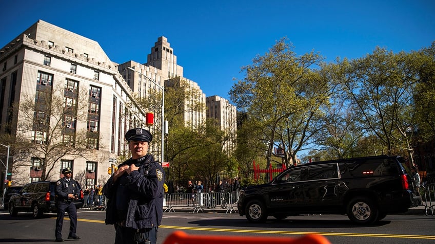 A Trump motorcade arrives at a NYC courthouse on April 22, 2024