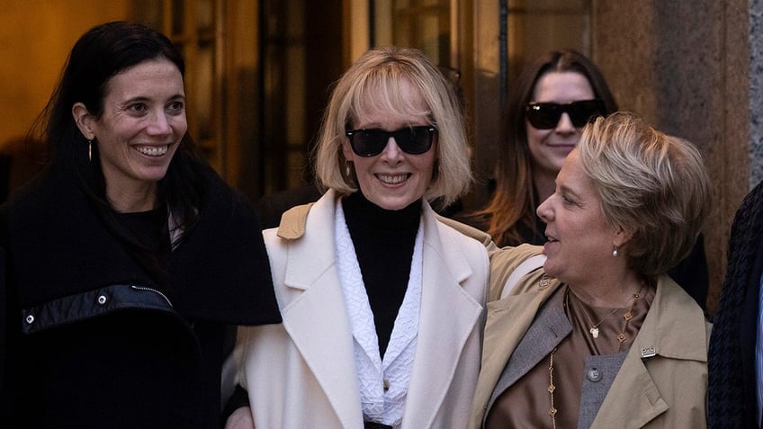 E. Jean Carroll smiling outside court