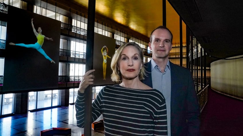 New York City Ballet's associate artistic director Wendy Whelan, left, and artistic director Jonathan Stafford, right, stand inside the lobby of the David H. Koch Theater at Lincoln Center
