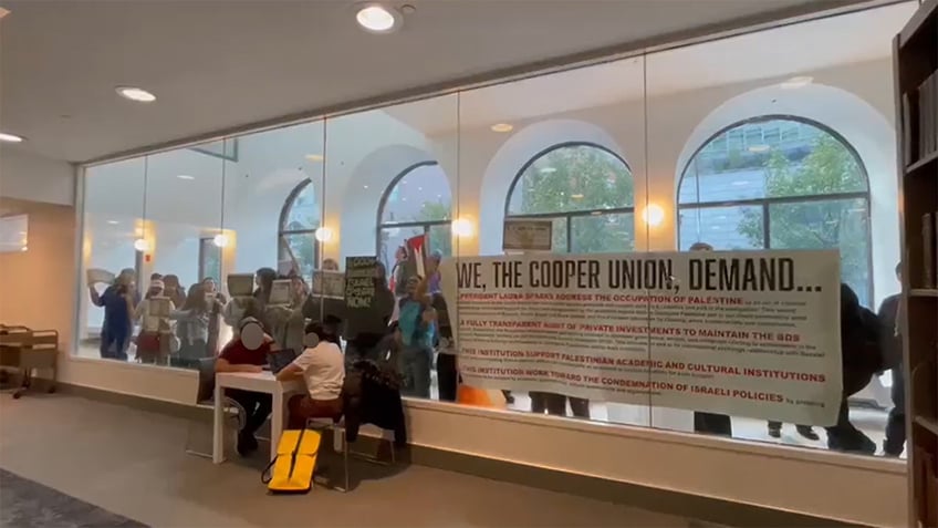 nyc colleges jewish students seen locked inside library as anti israel protest moves through building