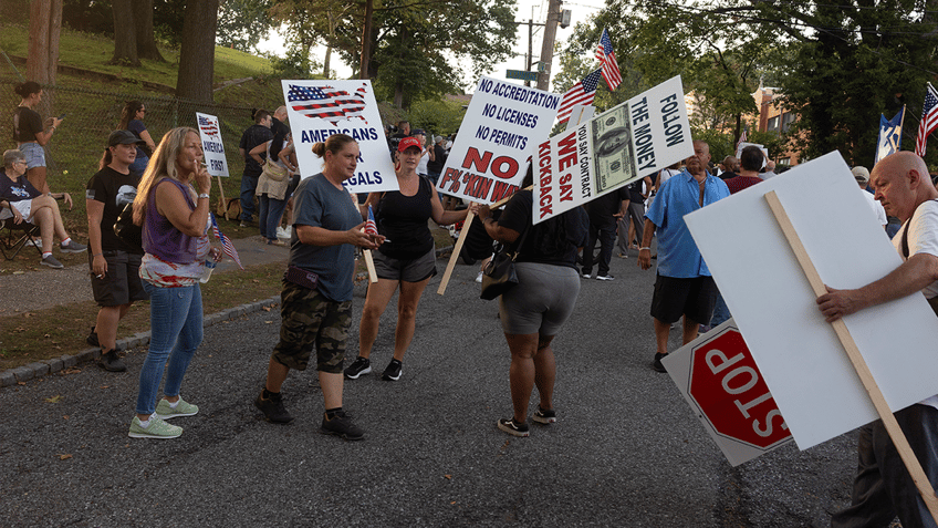 nyc residents protest on staten island as migrant crisis worsens claim they have not being vetted report