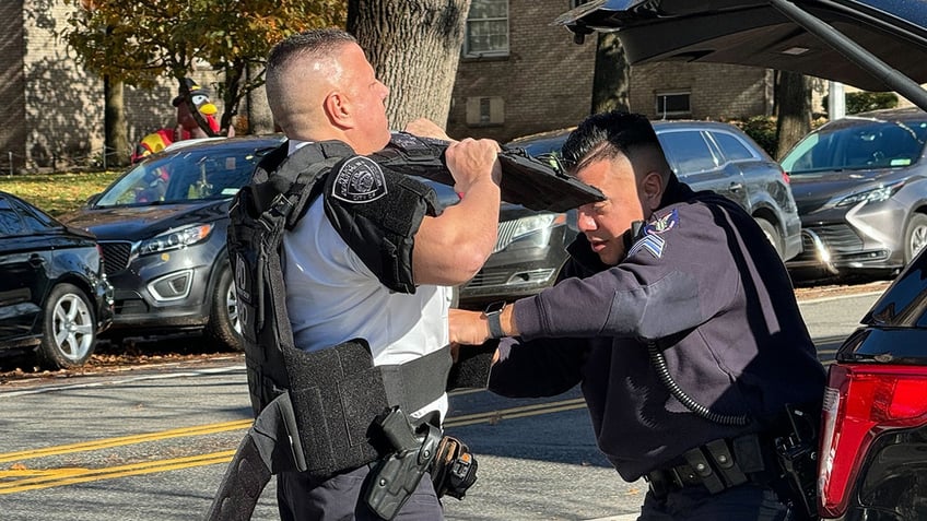 nypd exchanges gunfire with suspect barricaded inside queens apartment