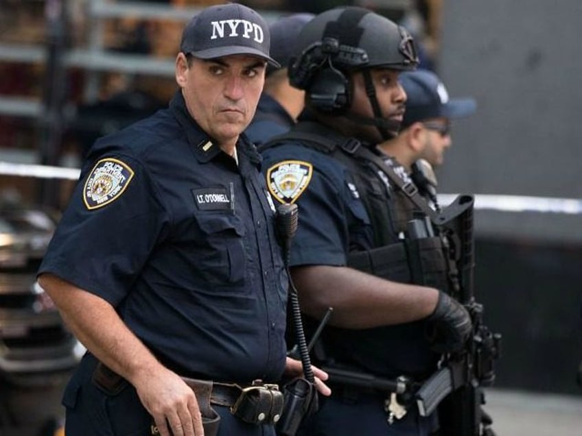 nypd officers attacked by man with meat cleaver