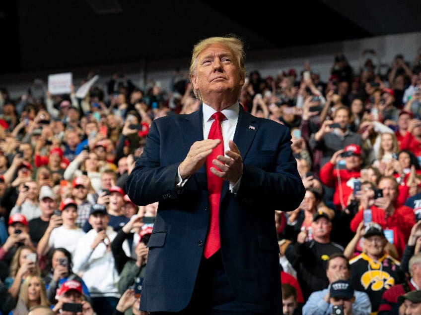 FILE - President Donald Trump arrives to speak at a campaign rally at the Knapp Center on