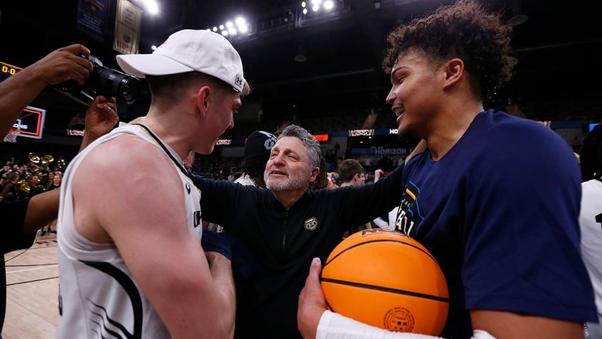 Greg Kempe celebrates win with team