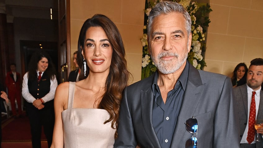 George Clooney with his wife Amal Clooney