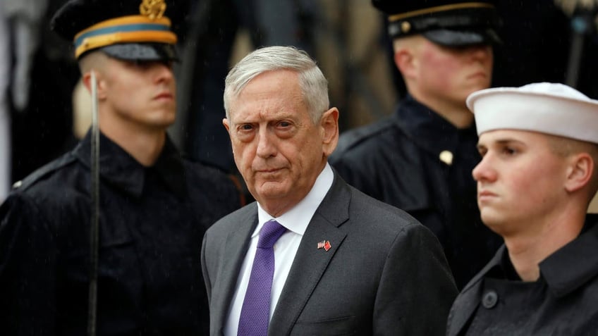 U.S. Defense Secretary James Mattis waits to welcome Chinese Minister of National Defense Gen. Wei Fenghe to the Pentagon in Arlington, Virginia, U.S., November 9, 2018