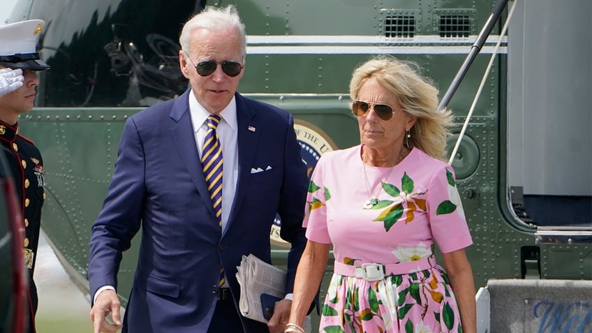 President Joe Biden with first lady Jill Biden exiting Marine One