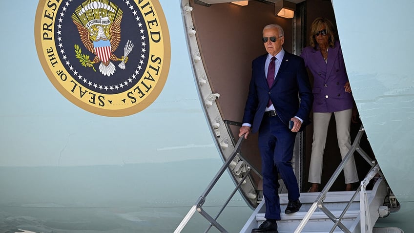 U.S. President Joe Biden and first lady Jill Biden disembark Air Force One